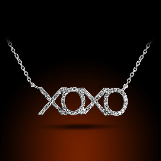 14K White Gold "XOXO" Diamond Pendant Set With 0.19Ct Diamonds